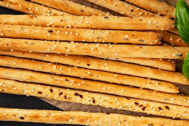 Grissotti ekmek çubuğu Grissini tahıl gevreği tahıl gevreği taze lezzetli gurme yemek arkaplanı masa rustik gıda üst görünümü fotokopi alanı