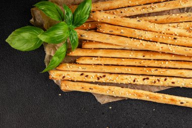 Grissotti ekmek çubuğu Grissini tahıl gevreği tahıl gevreği taze lezzetli gurme yemek arkaplanı masa rustik gıda üst görünümü fotokopi alanı