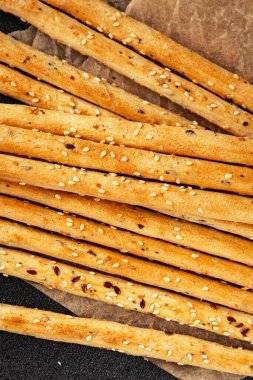 Grissotti ekmek çubuğu Grissini tahıl gevreği tahıl gevreği taze lezzetli gurme yemek arkaplanı masa rustik gıda üst görünümü fotokopi alanı