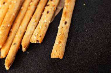 Grissotti ekmek çubuğu Grissini tahıl gevreği tahıl gevreği taze lezzetli gurme yemek arkaplanı masa rustik gıda üst görünümü fotokopi alanı