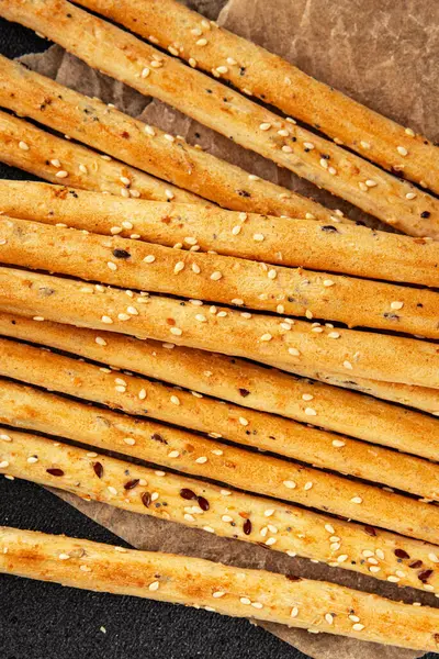 Grissotti ekmek çubuğu Grissini tahıl gevreği tahıl gevreği taze lezzetli gurme yemek arkaplanı masa rustik gıda üst görünümü fotokopi alanı