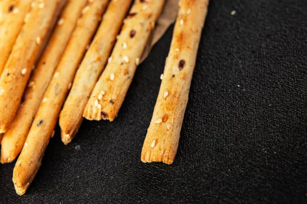 Grissotti ekmek çubuğu Grissini tahıl gevreği tahıl gevreği taze lezzetli gurme yemek arkaplanı masa rustik gıda üst görünümü fotokopi alanı