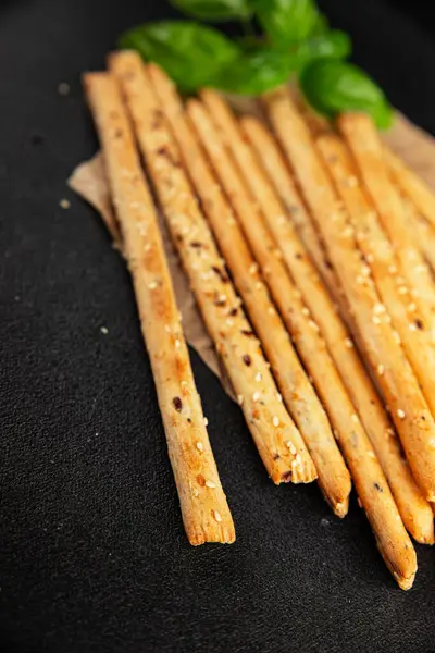 Grissotti ekmek çubuğu Grissini tahıl gevreği tahıl gevreği taze lezzetli gurme yemek arkaplanı masa rustik gıda üst görünümü fotokopi alanı