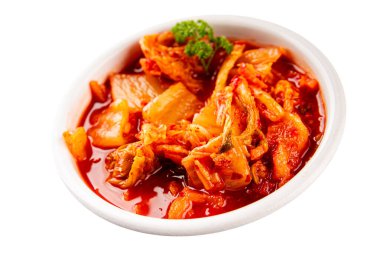 Kimçi salatalı lahana turşusu baharatlı baharatlı sebzeler lezzetli gurme yemek arkaplanı masanın üstünde rustik yiyecekler fotokopi alanı vejetaryen ve vejetaryen yemekleri.