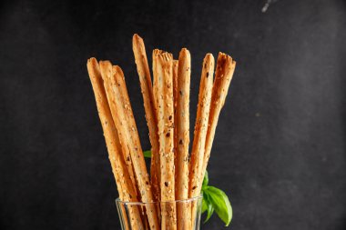 Grissotti ekmek çubuğu Grissini tahıl gevreği tahıl gevreği taze lezzetli gurme yemek arkaplanı masa rustik gıda üst görünümü fotokopi alanı