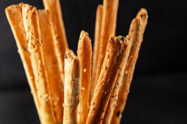 Grissotti ekmek çubuğu Grissini tahıl gevreği tahıl gevreği taze lezzetli gurme yemek arkaplanı masa rustik gıda üst görünümü fotokopi alanı