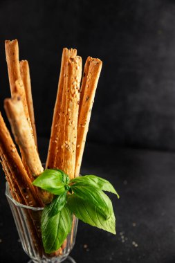 Grissotti ekmek çubuğu Grissini tahıl gevreği tahıl gevreği taze lezzetli gurme yemek arkaplanı masa rustik gıda üst görünümü fotokopi alanı