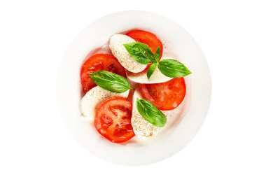 Caprese salatası mozzarella ve domates, fesleğen taze lezzetli gurme yemek arkaplan masa üzerinde rustik gıda üst görünüm fotokopi alanı keto ve paleo diyet vegan ve vegan gıda