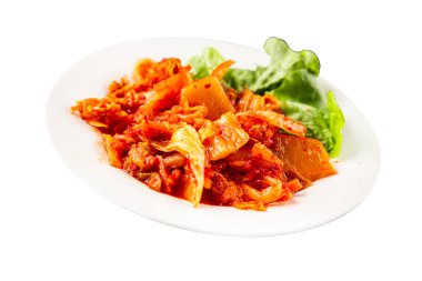 Kimçi salatalı lahana turşusu baharatlı baharatlı sebzeler lezzetli gurme yemek arkaplanı masanın üstünde rustik yiyecekler fotokopi alanı vejetaryen ve vejetaryen yemekleri.