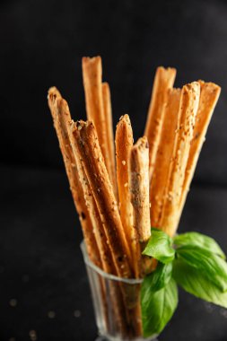 Grissotti ekmek çubuğu Grissini tahıl gevreği tahıl gevreği taze lezzetli gurme yemek arkaplanı masa rustik gıda üst görünümü fotokopi alanı