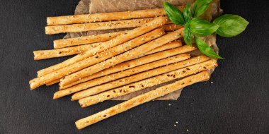 Grissotti ekmek çubuğu Grissini tahıl gevreği tahıl gevreği taze lezzetli gurme yemek arkaplanı masa rustik gıda üst görünümü fotokopi alanı