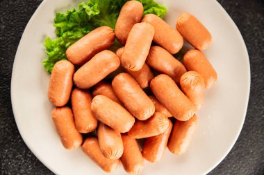 Mini sosisler taze işlenmiş et lezzetli çerezler lezzetli gurme yemek arkaplanı masa kırsal gıdalar üst görünüm fotokopi alanı