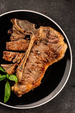 Biftek, biftek, biftek, biftek, lezzetli aperatif, lezzetli gurme yemek arka planı, masa sade yemekler, fotokopi odası.