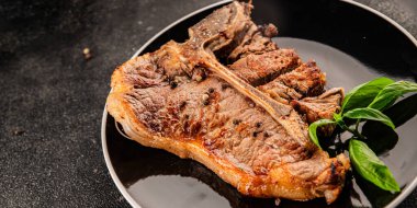 Biftek, biftek, biftek, biftek, lezzetli aperatif, lezzetli gurme yemek arka planı, masa sade yemekler, fotokopi odası.