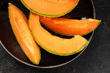 Kavun Charente olgun tatlı meyve lezzetli çerez lezzetli lezzetli gurme yemek arka planı masa üzerinde rustik gıda fotokopi alanı keto ve paleo diyet vegan ve vejetaryen gıda