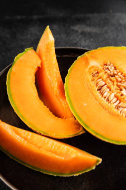 Kavun Charente olgun tatlı meyve lezzetli çerez lezzetli lezzetli gurme yemek arka planı masa üzerinde rustik gıda fotokopi alanı keto ve paleo diyet vegan ve vejetaryen gıda