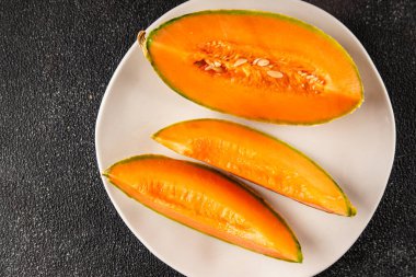 Kavun Charente olgun tatlı meyve lezzetli çerez lezzetli lezzetli gurme yemek arka planı masa üzerinde rustik gıda fotokopi alanı keto ve paleo diyet vegan ve vejetaryen gıda