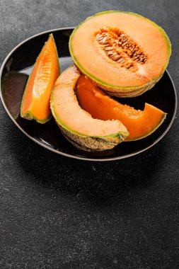 Kavun Charente olgun tatlı meyve lezzetli çerez lezzetli lezzetli gurme yemek arka planı masa üzerinde rustik gıda fotokopi alanı keto ve paleo diyet vegan ve vejetaryen gıda