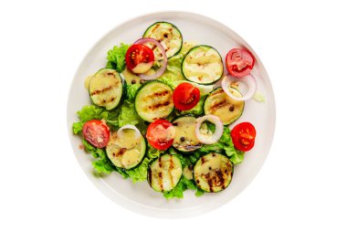 Salata ızgara kabak, domates, marul, lezzetli aperatif lezzetli lezzetli gurme yemek arkaplan masa üzerinde rustik gıda üst görünüm fotokopi alanı keto ve paleo diyet vegan ve vejetaryen gıda