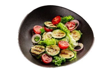 Salata ızgara kabak, domates, marul, lezzetli aperatif lezzetli lezzetli gurme yemek arkaplan masa üzerinde rustik gıda üst görünüm fotokopi alanı keto ve paleo diyet vegan ve vejetaryen gıda
