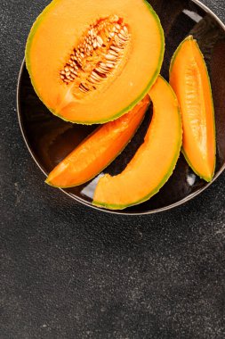 Kavun Charente olgun tatlı meyve lezzetli çerez lezzetli lezzetli gurme yemek arka planı masa üzerinde rustik gıda fotokopi alanı keto ve paleo diyet vegan ve vejetaryen gıda