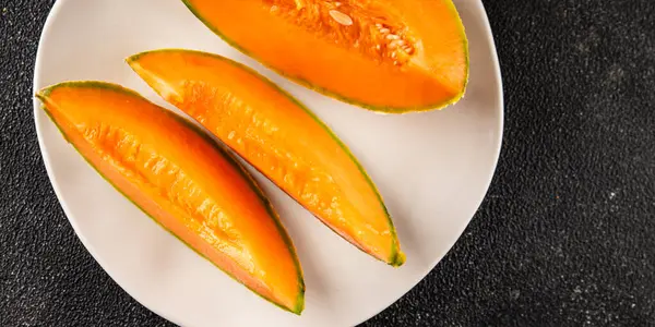 Kavun Charente olgun tatlı meyve lezzetli çerez lezzetli lezzetli gurme yemek arka planı masa üzerinde rustik gıda fotokopi alanı keto ve paleo diyet vegan ve vejetaryen gıda