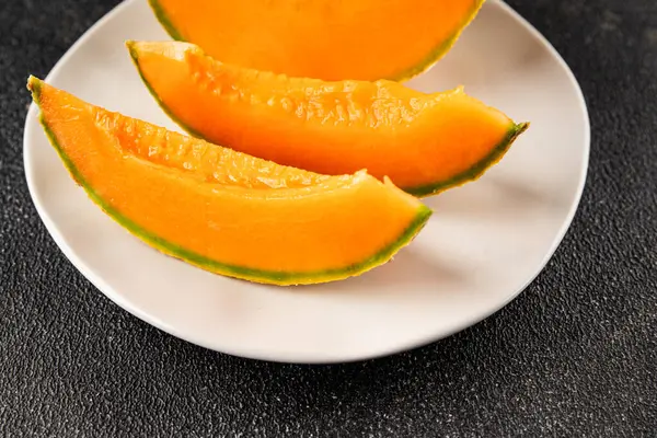 Kavun Charente olgun tatlı meyve lezzetli çerez lezzetli lezzetli gurme yemek arka planı masa üzerinde rustik gıda fotokopi alanı keto ve paleo diyet vegan ve vejetaryen gıda