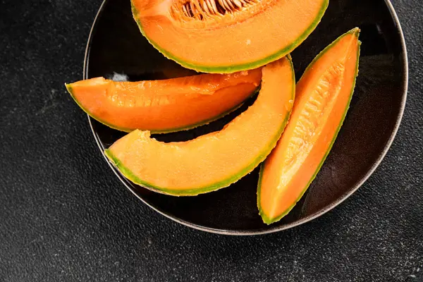 Kavun Charente olgun tatlı meyve lezzetli çerez lezzetli lezzetli gurme yemek arka planı masa üzerinde rustik gıda fotokopi alanı keto ve paleo diyet vegan ve vejetaryen gıda