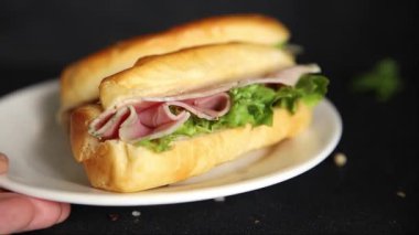 Ham sandwich green leaf salad, spam, meat snack vegetables natural product tasty tasty snack fresh delicious gourmet food background on the table rustic top view copy space