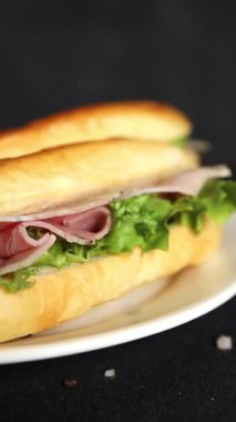 Ham sandwich green leaf salad, spam, meat snack vegetables natural product tasty tasty snack fresh delicious gourmet food background on the table rustic top view copy space