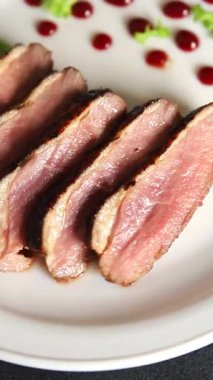 Duck breast roast poultry fresh natural product tasty snack delicious gourmet food background on the table rustic top view copy space