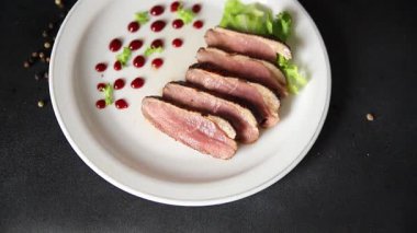 Duck breast roast poultry fresh natural product tasty snack delicious gourmet food background on the table rustic top view copy space