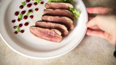 Duck breast roast poultry fresh natural product tasty snack delicious gourmet food background on the table rustic top view copy space