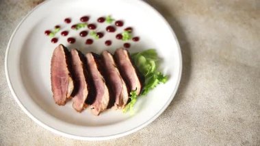 Duck breast roast poultry fresh natural product tasty snack delicious gourmet food background on the table rustic top view copy space