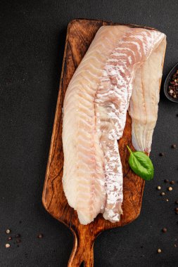 Fileto morina balığı deniz mahsulleri yaygın ling doğal ürün lezzetli aperatif lezzetli lezzetli gurme yemek arkaplan masa üzerinde rustik üst görünüm fotokopi alanı pesseeter diyet