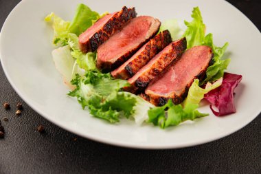 Duck breast roast poultry fresh natural product tasty snack delicious gourmet food background on the table rustic top view copy space