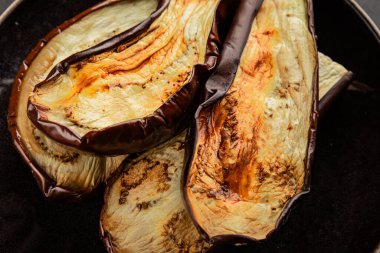Baked eggplant grilled vegetables fresh natural product tasty snack delicious gourmet food background on the table rustic top view copy space keto and paleo diet vegan and vegan food