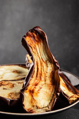 Baked eggplant grilled vegetables fresh natural product tasty snack delicious gourmet food background on the table rustic top view copy space keto and paleo diet vegan and vegan food