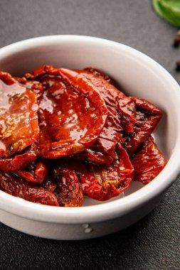Sun-dried tomatoes snack vegetables natural product tasty snack fresh delicious gourmet food background on the table rustic top view copy space keto and paleo diet vegan and vegan food