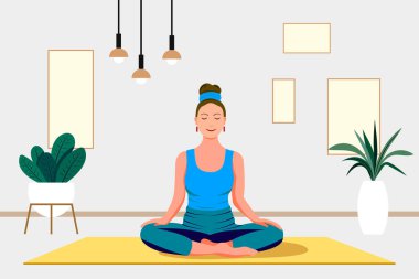 Evde yoga stüdyosu var. Evde yoga dersleri. Modern bir apartmanın içinde. Yoga konsepti.