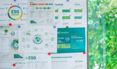 ESG ( environment, social,governance) recycle sign on laptop screen with carbon free chart board in office clipart