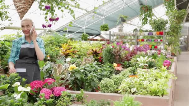 Pretty Female Florist Talking Phone Garden Centre Attractive Young Woman — Stock Video