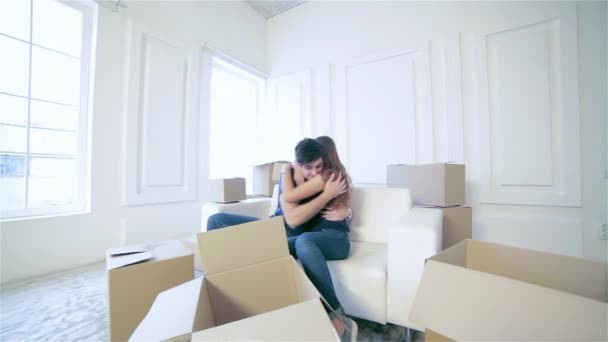 Moving New House Repairs Apartment Love Couple Sitting Couch Hugging — Stock Video