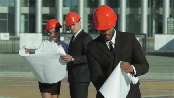 Three Confident Business Architect Protective Helmet Standing Site View Object — Stock Video