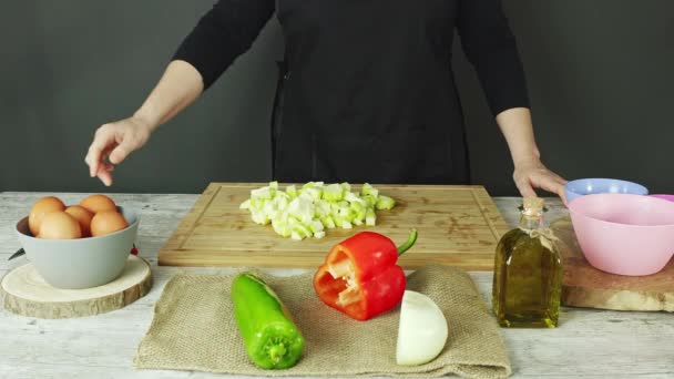 Working Woman Picking Courgette Wooden Kitchen Board Put Pink Boll — Stockvideo
