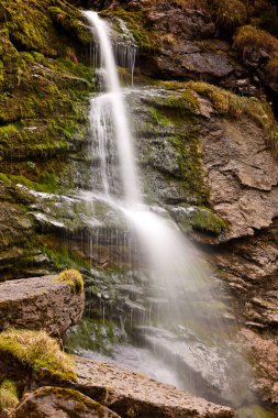 Water going down mountain in Switzerland nature