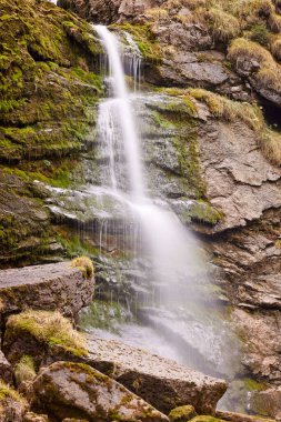 Water going down mountain in Switzerland nature