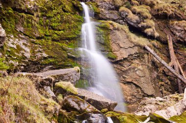 Water going down mountain in Switzerland nature