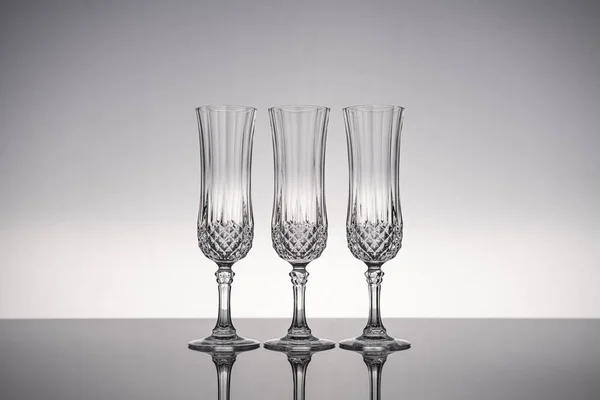 Cut Glass Crystal Stemware Champagne Flute Isolated Shiny Gray Surface — Stock Photo, Image
