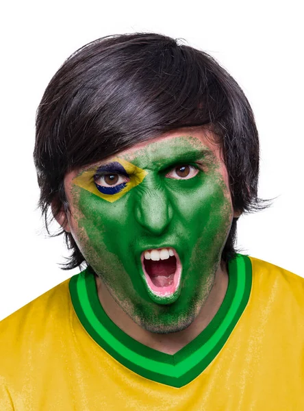 Футбольный Фанат Майкой Лицом Раскрашенным Флагом Команды Бразилии Кричащий Волнения — стоковое фото